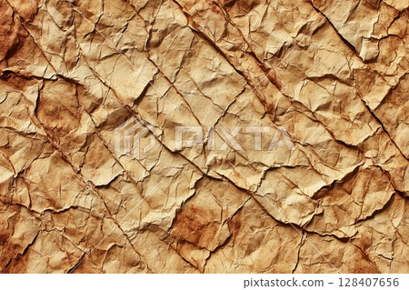 Intricate aged parchment texture with creases and stains 128407656