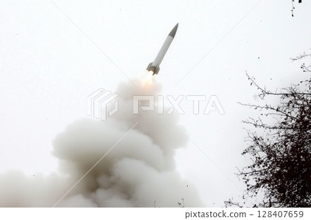 Launch of a ballistic missile from a ground-based missile silo. 128407659