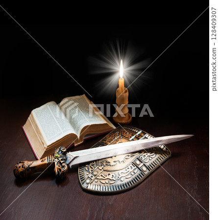 Book with sword and shield Book with sword and shield 128409307