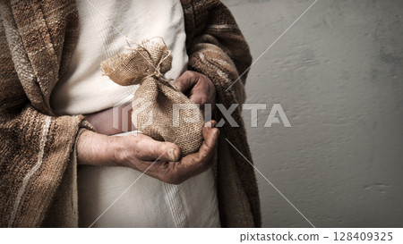Male hands holding a bag Male hands holding a bag 128409325