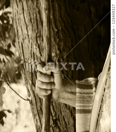 Man's hand with old cane Man's hand with old cane 128409327