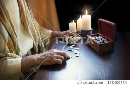 Man collect old silver coins 128409334