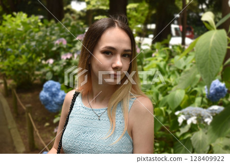 Young woman with ombre hair in Hydrangea Garden Portrait 128409922