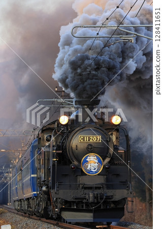 SL Taiki C11 steam locomotive arrives spewing smoke on the Tobu Kinugawa Line 128411651