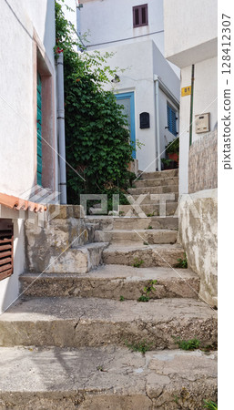 Narrow street in the old town of Baska Narrow street in the old town of Baska 128412307