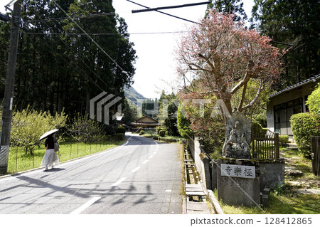 Iwami Ginzan Silver Mine - Gokurakuji Temple and the Jizo statue with the temple name carved into it in the Ginzan area 128412865