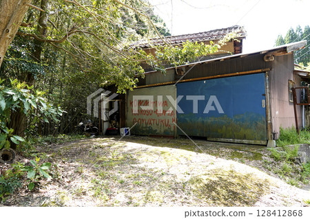 Greetings written in Roman letters on the wall of an old house in the Ginzan district of Iwami Ginzan Greetings written in Roman letters on the wall of an old house in the Ginzan district of Iwami Ginzan 128412868