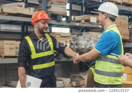Teamwork Warehouse worker shakehand together. Engineer man hands partnership. Diversity Coworker Men logistics Warehouse teams handshake. Multiracial Support team greeting person teamwork colleagues Teamwork Warehouse worker shakehand together. Engineer man hands partnership. Diversity Coworker Men logistics Warehouse teams handshake. Multiracial Support team greeting person teamwork colleagues 128413537