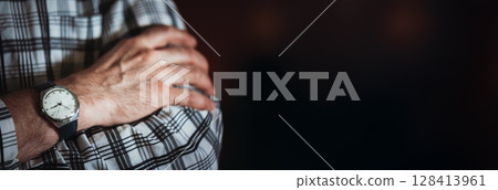 Close-Up of a Watch on Someone's Arm Displaying Class Close-Up of a Watch on Someone's Arm Displaying Class 128413961
