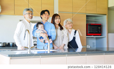 Smiling three-generation family surrounding a baby Smiling three-generation family surrounding a baby 128414128