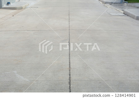 Concrete pavement road floor suit for concept and background. Concrete pavement road floor suit for concept and background. 128414901