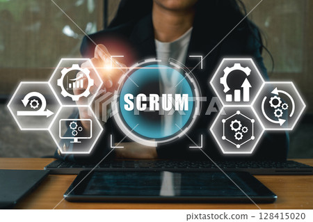A business professional interacts with a digital scrum interface, showcasing agile project management and teamwork concepts. A business professional interacts with a digital scrum interface, showcasing agile project management and teamwork concepts. 128415020