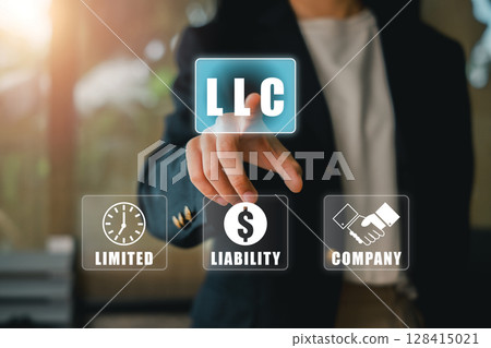 Businessman interacting with virtual LLC icon, symbolizing limited liability company in a digital business setting. 128415021