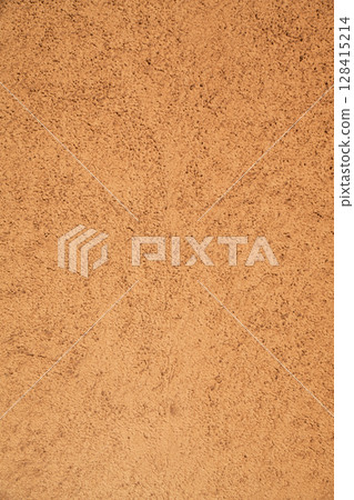 Beige and brown wall texture with rough surface, rough concrete surface texture 128415214
