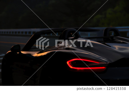 Glossy black open car Glossy black open car 128415338