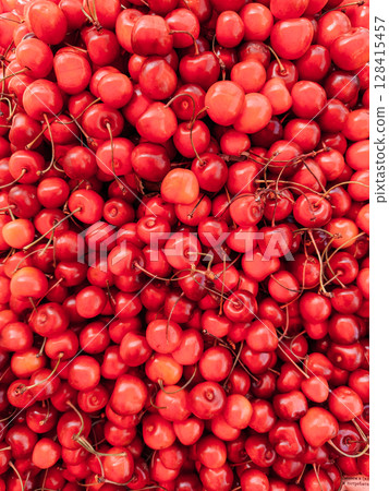lots of ripe red cherries for food as background 128415457
