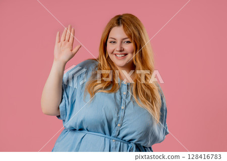 Friendly Plus Size Woman Waving Hand - Hello, Hi. Greetings, Salute On Pink 128416783