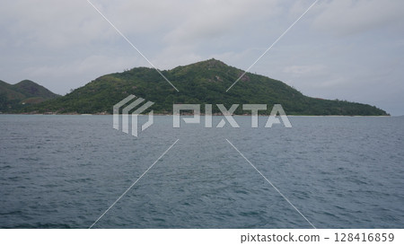 Sailing on a boat around Seychelles island in January Sailing on a boat around Seychelles island in January 128416859