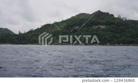 Panoramic view from a boat of Seychelles island in January Panoramic view from a boat of Seychelles island in January 128416860