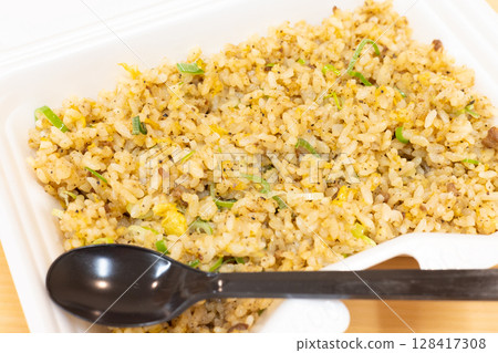 Delicious fried rice with green onions and minced pork 128417308