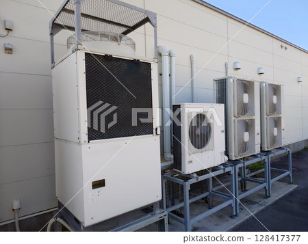 Air conditioner outdoor unit installed outdoors 128417377