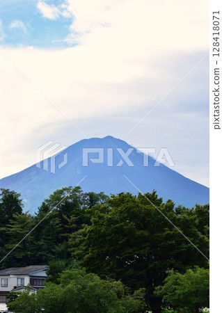 Mount Fuji with clouds hanging over it 128418071