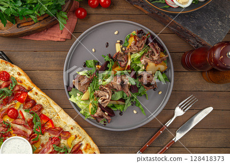 Meat salad with greens plum and pine nuts Meat salad with greens plum and pine nuts 128418373