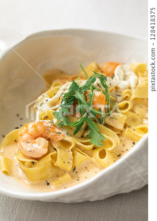 Fettuccine pasta with shrimp and creamy sauce Fettuccine pasta with shrimp and creamy sauce 128418375