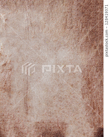 Textured brown stone surface with natural patterns Textured brown stone surface with natural patterns 128419371