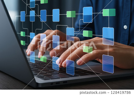 Person is typing on a laptop with a complex network of squares 128419786