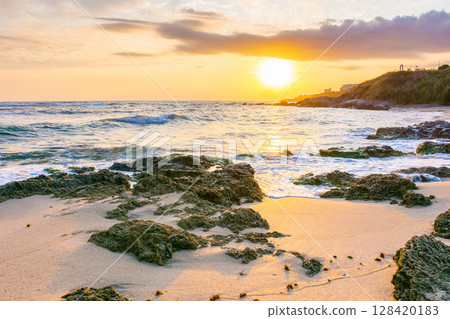summer vacation at the sea. nature landscape with beach at sunrise 128420183