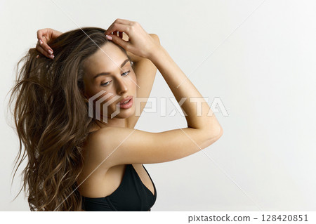 brunette girl with healthy hair. beautiful young woman 128420851