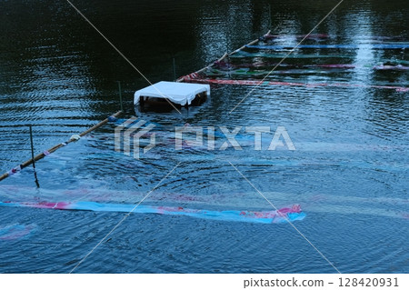 Kyoto Yuzen fabrics lined up along the Kamo River 128420931