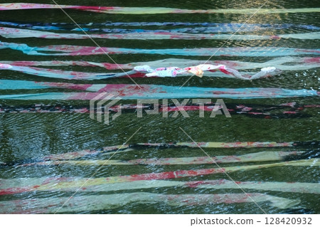 Kyoto Yuzen fabrics lined up along the Kamo River 128420932