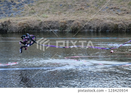Kyoto Yuzen fabrics lined up along the Kamo River 128420934