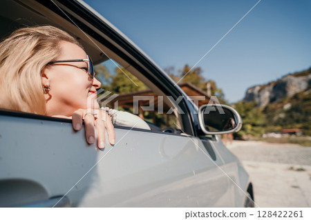 Woman in a Car, Gazing Out the Window Woman in a Car, Gazing Out the Window 128422261