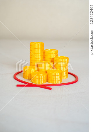 Money coins inside the circle of red line. Limited budget. Cost control, minimalism, or managing limited resources effectively. Budget restrictions 128422465