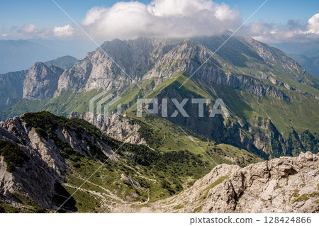 Rugged Alpine Peaks And Verdant Valleys In The Grigna Massif: Scenic Mountain Landscape In Lombardy Region Of Northern Italy Near Lake Como 128424866