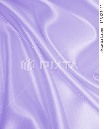 Smooth elegant lilac silk or satin texture as wedding background. Luxurious background design Smooth elegant lilac silk or satin texture as wedding background. Luxurious background design 128425415