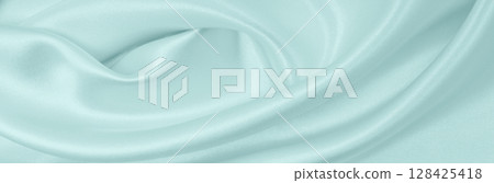 Smooth elegant blue silk or satin luxury cloth texture as abstract background. Luxurious background design 128425418