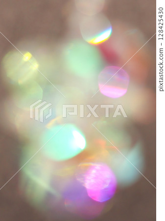 Soft focus colorful bokeh lights creating a dreamy abstract background Soft focus colorful bokeh lights creating a dreamy abstract background 128425430