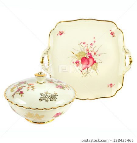 Vintage porcelain candy bowl and a porcelain tray isolated on white. Collage. 128425465