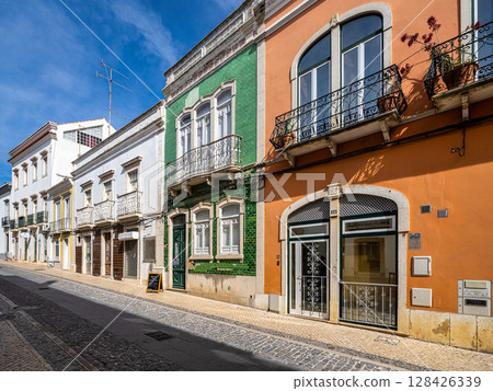 Traditional old Portuguese houses at Rua Filipe Alistao street in old town of Faro, Algarve, Portugal 128426339