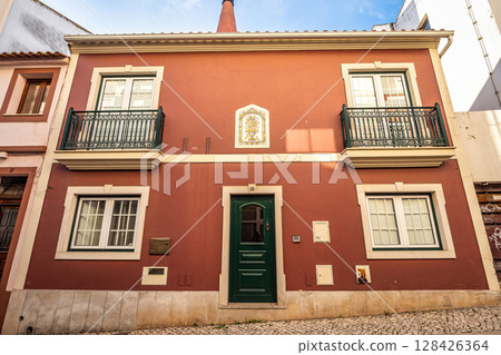 View of modern and historic buildings in the center of Silves, Algarve region, Portugal. 128426364