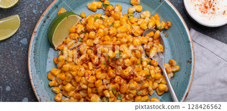 Esquites mexican street corn salad with chili, cilantro and lime juice 128426562