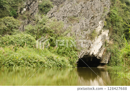 Cave in Van Long. Cave in Van Long. 128427688