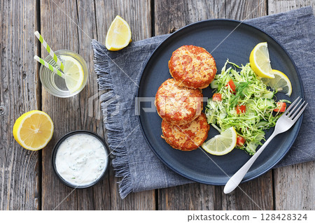 Hot Smoked salmon burgers, patties and coleslaw Hot Smoked salmon burgers, patties and coleslaw 128428324