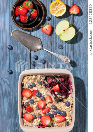 apple blueberry strawberry crumble in baking dish apple blueberry strawberry crumble in baking dish 128428330