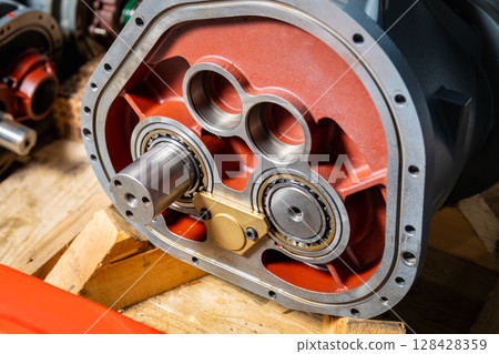 Crosshead of screw compressor showing ball bearings and cylinder block 128428359
