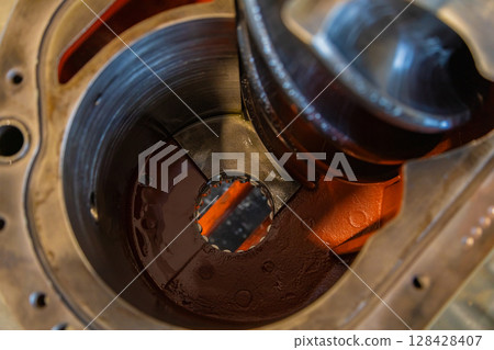 Inside view of hydraulic pump showing gears and housing 128428407